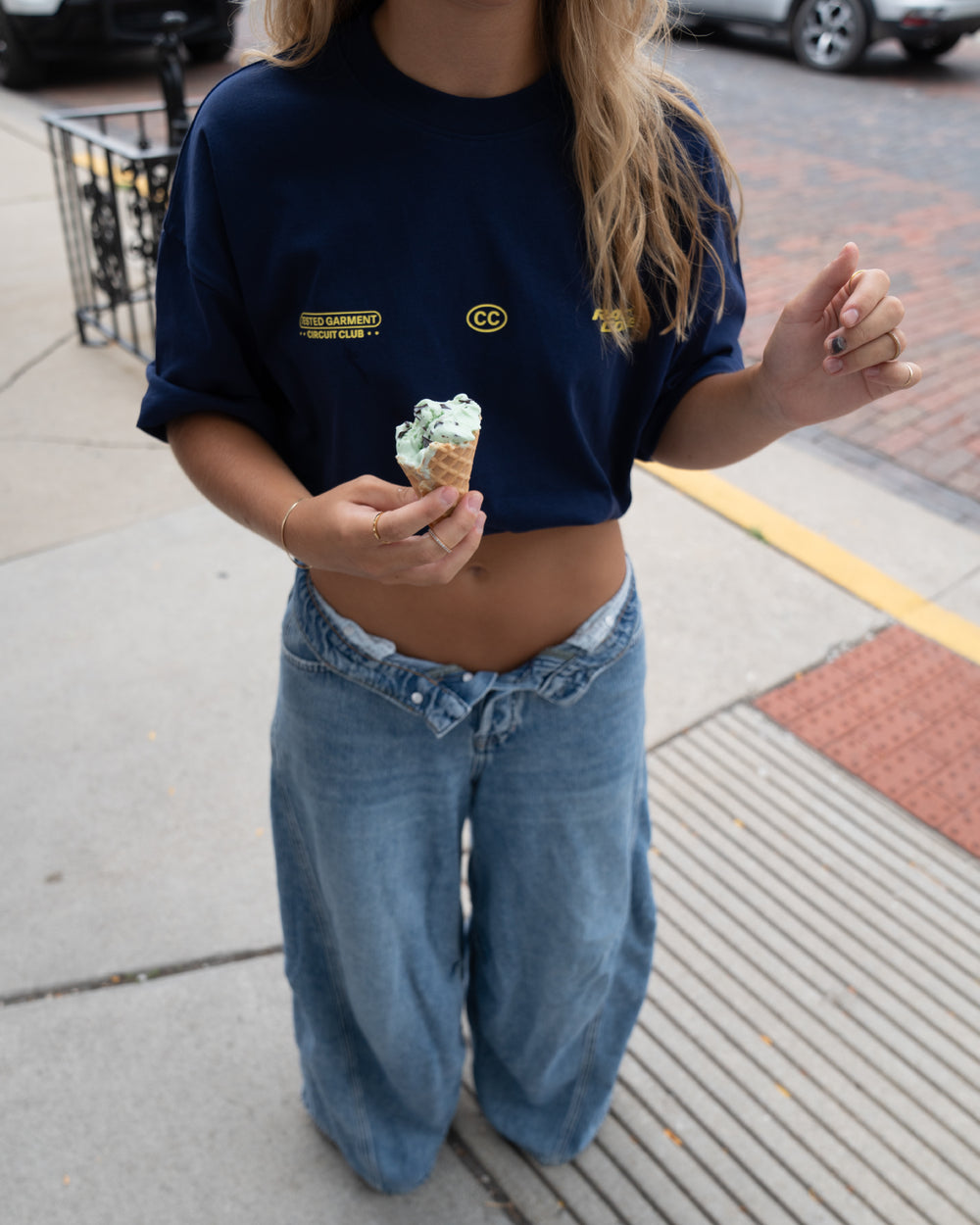 Woman wearing the Circuit Club Navy Tee, back detail