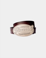 Cowboy Belt rolled, showing the oval Racecode buckle with Motor & Co. and Race your life