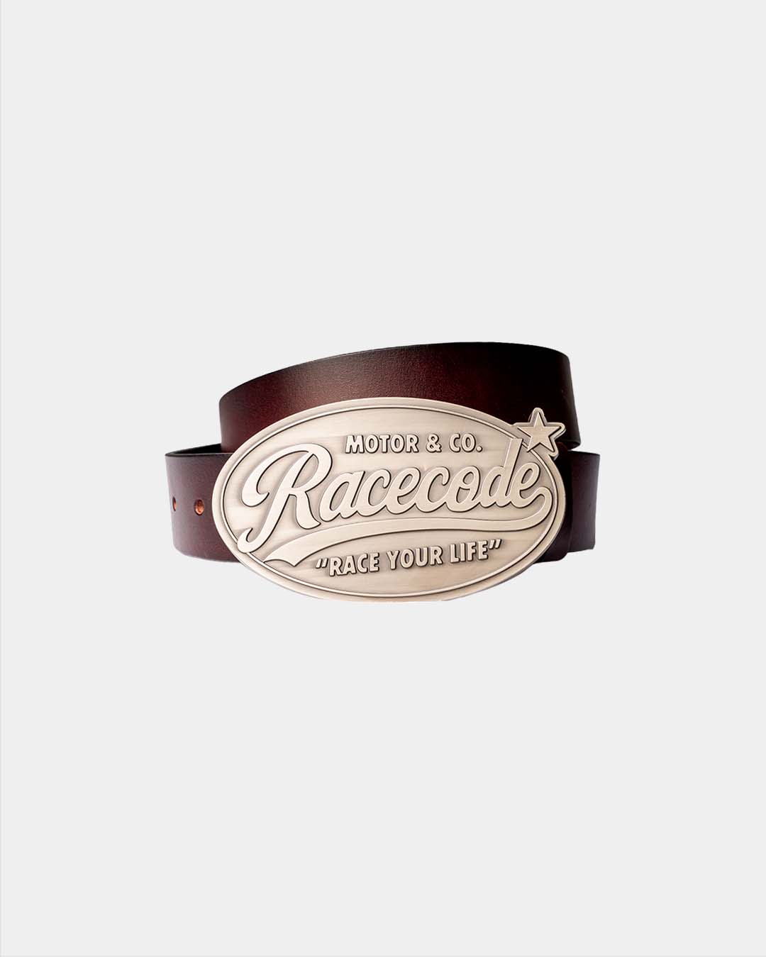 Cowboy Belt rolled, showing the oval Racecode buckle with Motor & Co. and Race your life